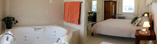 The spa and bedroom in the Lemon Tree Spa Apartment at Strathlyn